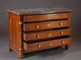 an antique chest of drawers with marble top and brass hardware