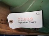 a label on a sewing machine that is on a table