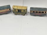 several toy trains are lined up in a circle on a white surface