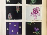 an old book with a bunch of different designs on it