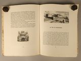 an open book with a picture of a train on it