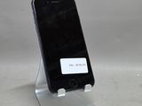 un téléphone portable posé sur un support