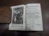 un vieux livre avec l'image d'un homme et d'une femme