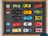 a box with a variety of toy cars in it