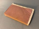 an old book that is sitting on a table