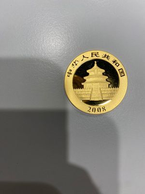 La pièce d'or est ornée d'une pagode