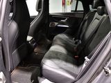 a picture of the inside of a car with the door open
