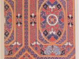 a framed picture of a colorful rug with a pattern on it