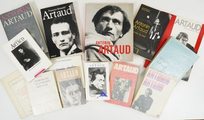 a lot of books that are sitting on a table