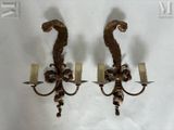 paire d'appliques murales anciennes en laiton ornées de têtes de dragon