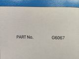 a close up of a piece of paper with the words part no g6667 on it