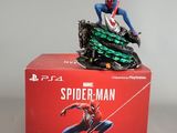 a close up of a box with a spider - man figurine on top of it