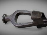 a close up of a metal clamp on a table
