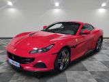 une Ferrari rouge garée dans un garage