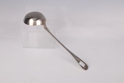 silver spoon with a handle on a white surface