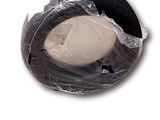 a picture of a plastic bowl with a brown substance inside of it