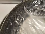 a plastic bag that is sitting on top of a stove