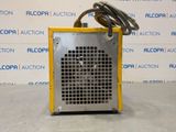a close up of a machine with a hose attached to it