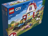 a box of lego city farm with a tractor and farm animals