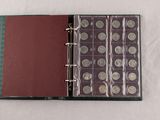 a binder that has a lot of coins on it
