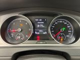 a close up of a car dashboard with various gauges