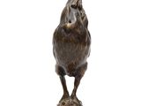 bronze statue of a rooster on a pedestal on a white background