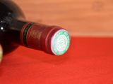 a bottle of wine that is sitting on a table