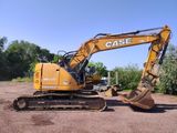 a picture of a yellow and black excavator