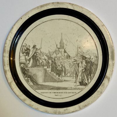 une photo d'une assiette sur laquelle figurent des personnes