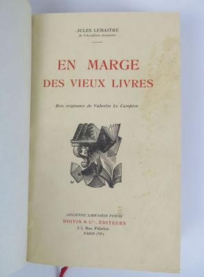 an open book with a drawing of a man holding a book