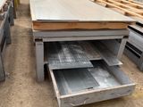 many different types of steel plates in a warehouse