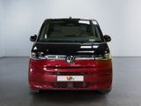 the red and black van is parked in a white room
