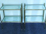 pair of brass and glass side tables with glass shelves