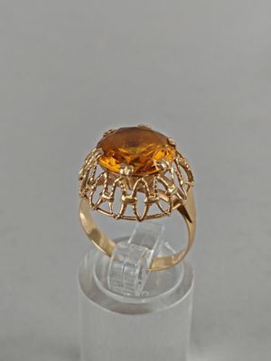 an image of a gold ring with a citrine stone in it