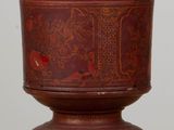 a wooden box with a lid sitting on a table