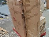many boxes stacked on a pallet in a warehouse