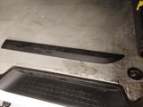 a black and white stove top with a black stove top