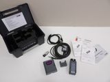 an image of a printer and other electronics sitting on a table