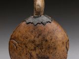 an image of a small wooden object with a bird on top of it