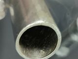 a close up of a metal pipe on a table