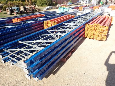 many different types of steel bars stacked on the ground
