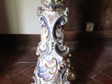 a small table that is sitting on a tiled floor