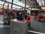 an image of a large machine in a warehouse