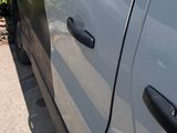 a white van parked on the side of the road