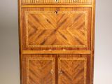 an old wooden cabinet with drawers and drawers on top of it