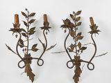 pair of antique wrought iron wall sconces with leaves and flowers