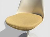 une chaise blanche avec une assise jaune et un piètement blanc