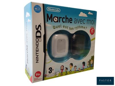 boîte de jeu Nintendo Wii avec deux manettes et une boîte sur laquelle figure le visage d'un enfant