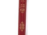 a red book that is sitting on a white table