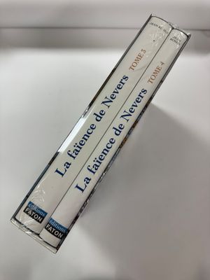 a box of cigarettes sitting on top of a toilet